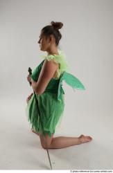 KATERINA KNNELING POSE WITH SWORD